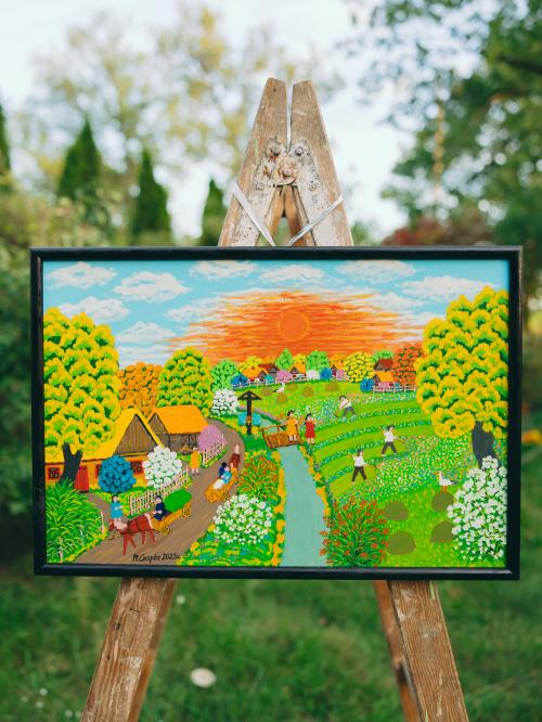 obraz olejny sianokosy wiszący na deskach