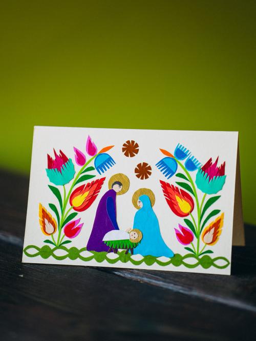 kartka wycinanka świąteczna na tle zielonego