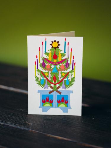 Kartka wycinanka świąteczna - choinka na skrzyni niebieskiej